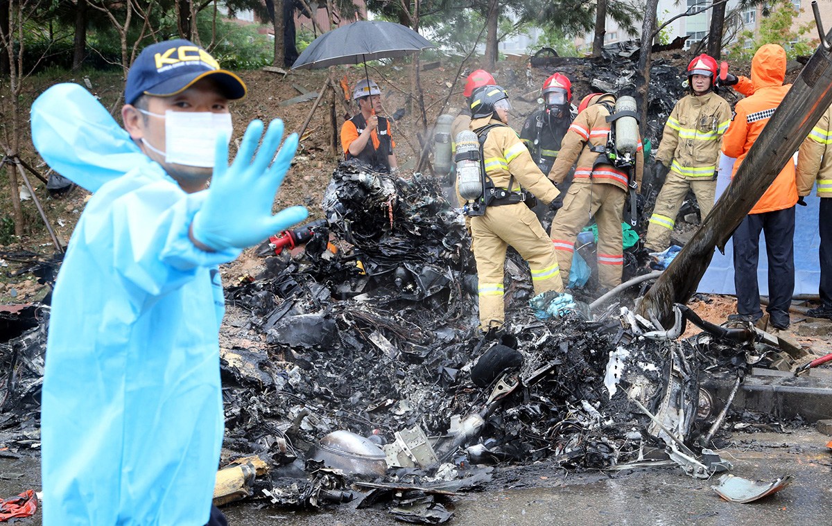 韩坠机遇难者生前预留丧葬费，生命最后一刻的温情与遗憾